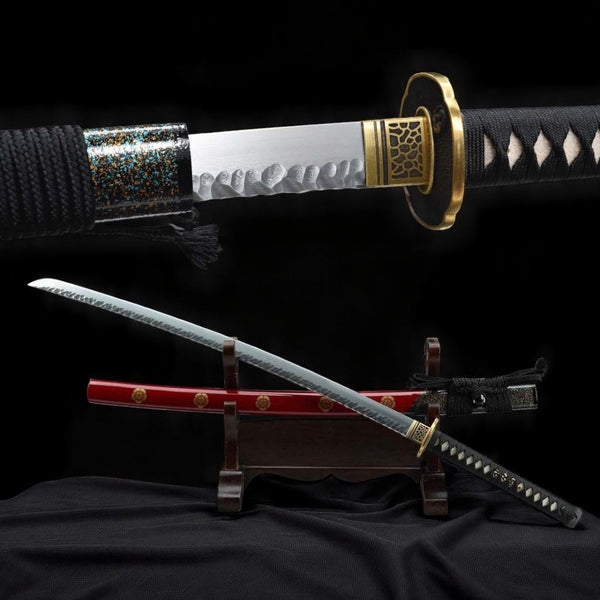 Flower of Fire katana replica — Damascus blade with hamon, brass tsuba with brass rim, red saya on stand