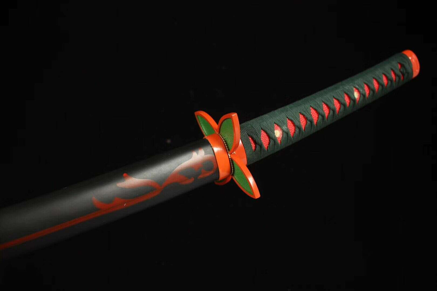 Side profile of Shinobu Kocho Demon Slayer katana on black background