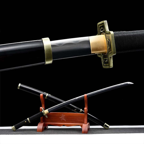 Yubashiri One Piece katana replica — dark blade with silver hamon, black tsuba, black saya with brass fittings